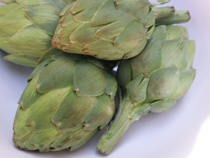 Artichokes with bacon and vegetables