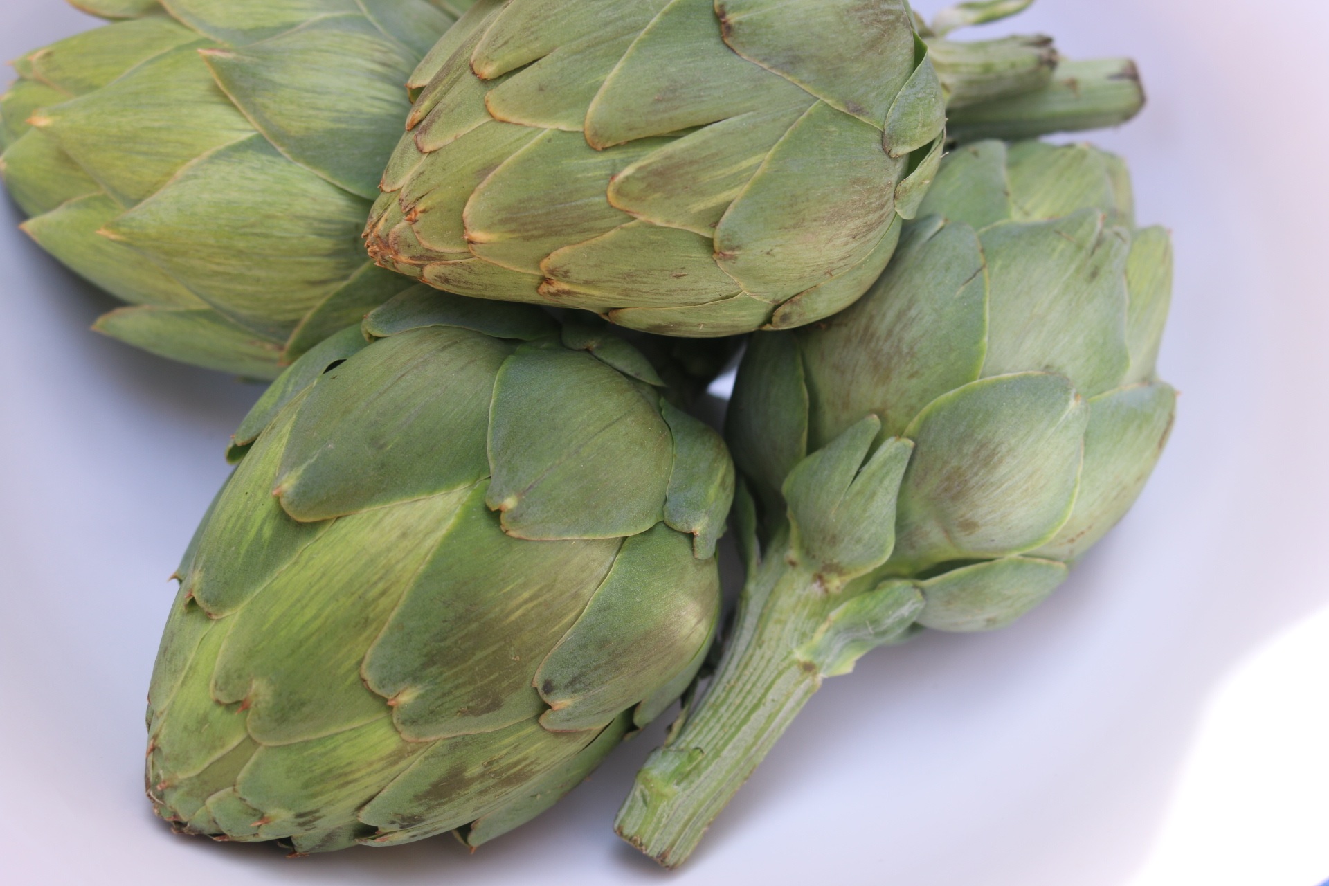 Artichokes with bacon and vegetables