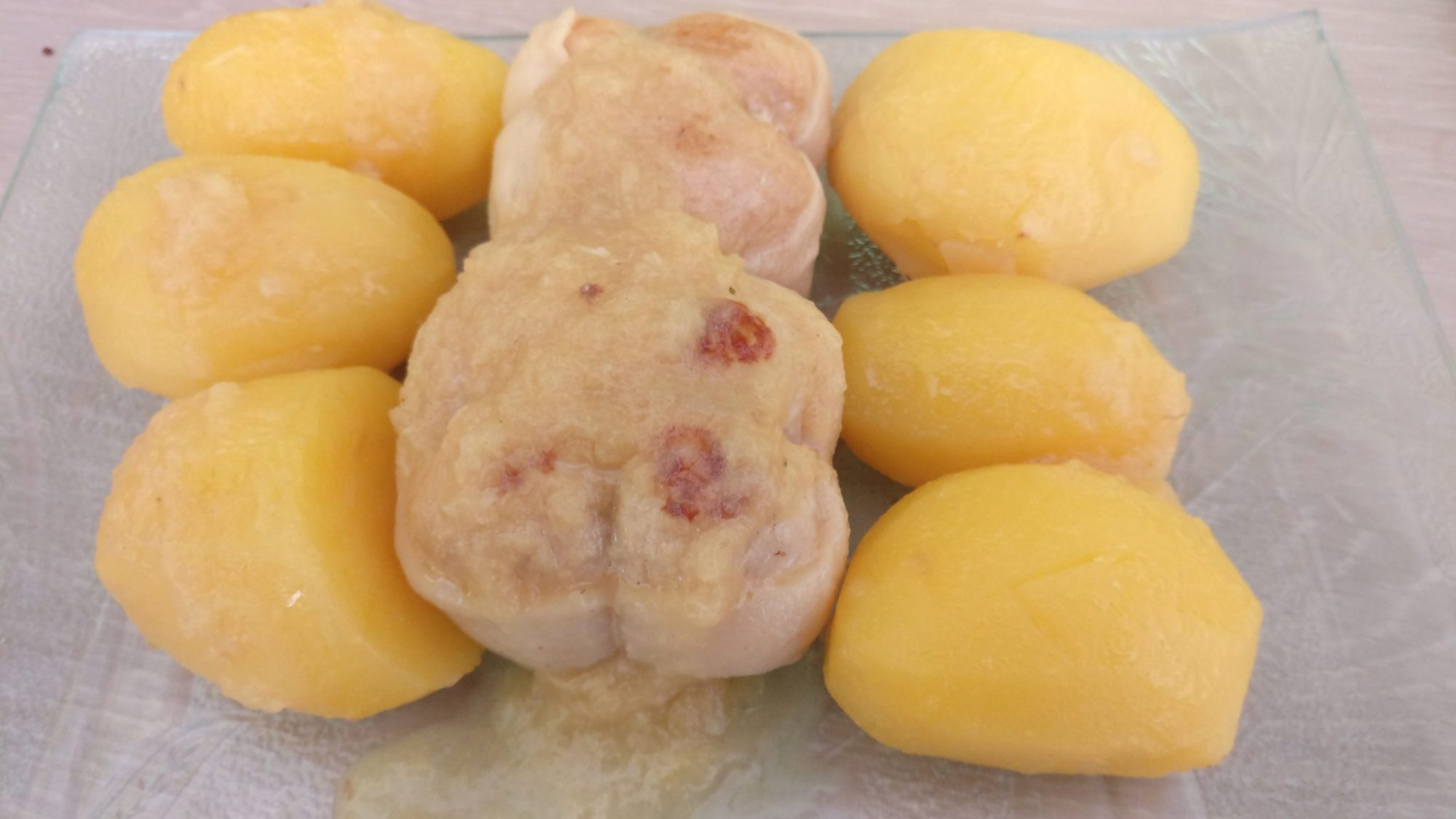 Pork roll with pineapple sauce and potatoes