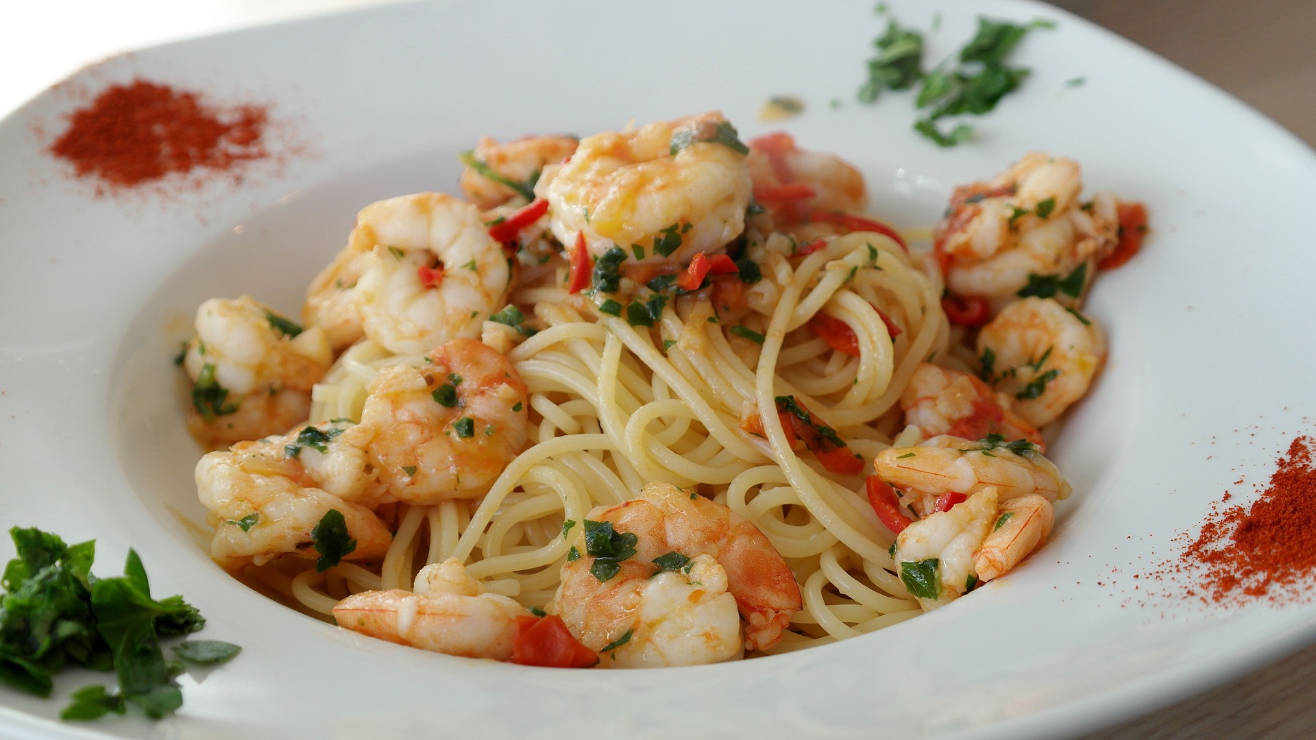 Pasta with sausages and shrimps