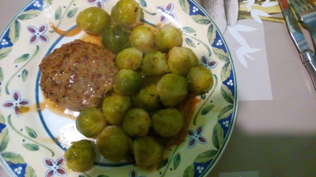 Steak with onion and parsley and Brussels sprouts