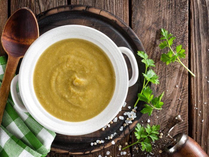 Smooth soup with radishes leaves