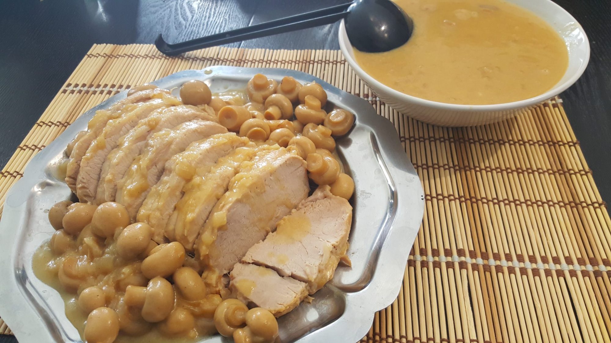 Pork roast with mushrooms, white wine sauce and mustard